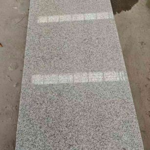 黑河芝麻白光面毛板